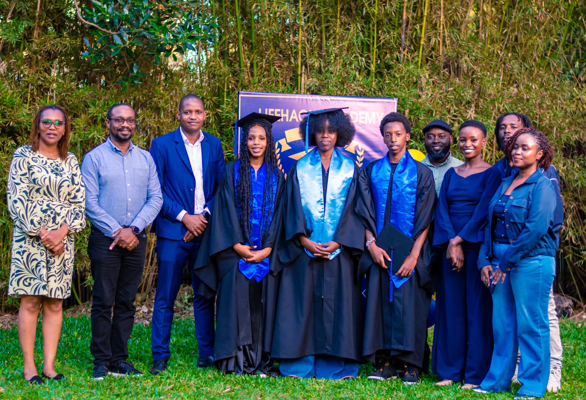 LifeHack International School graduates in caps and gowns with teachers at the Class of 2025 graduation in Kenya