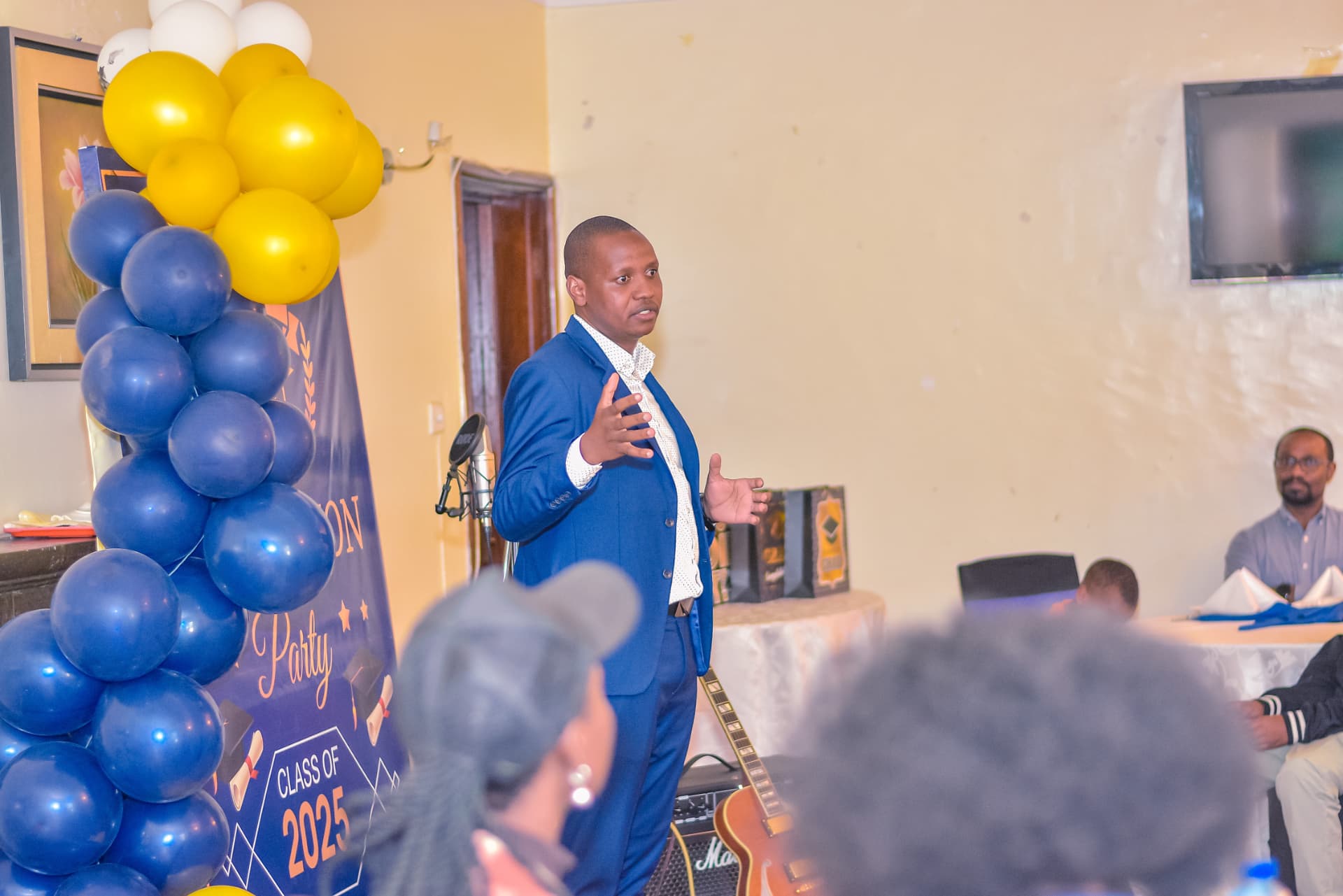 LifeHack International School director addressing students and parents at a school event in Kenya
